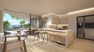 Cocina elegante con salida a terraza frente al mar