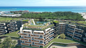 Vista aérea de un complejo residencial junto al mar