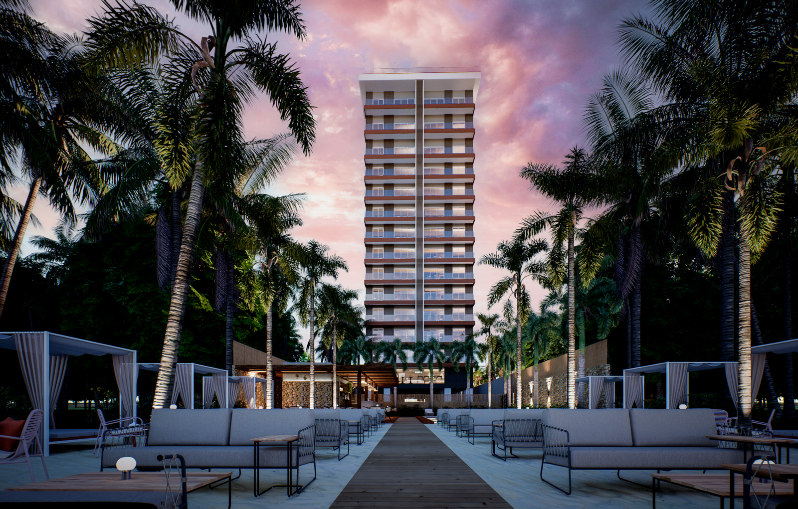 Juan Dolio, Malecón: torre residencial al atardecer