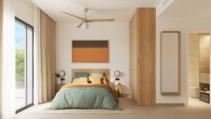 Dormitorio con cama doble y armarios de madera