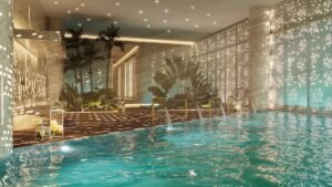Piscina iluminada interior del complejo residencial